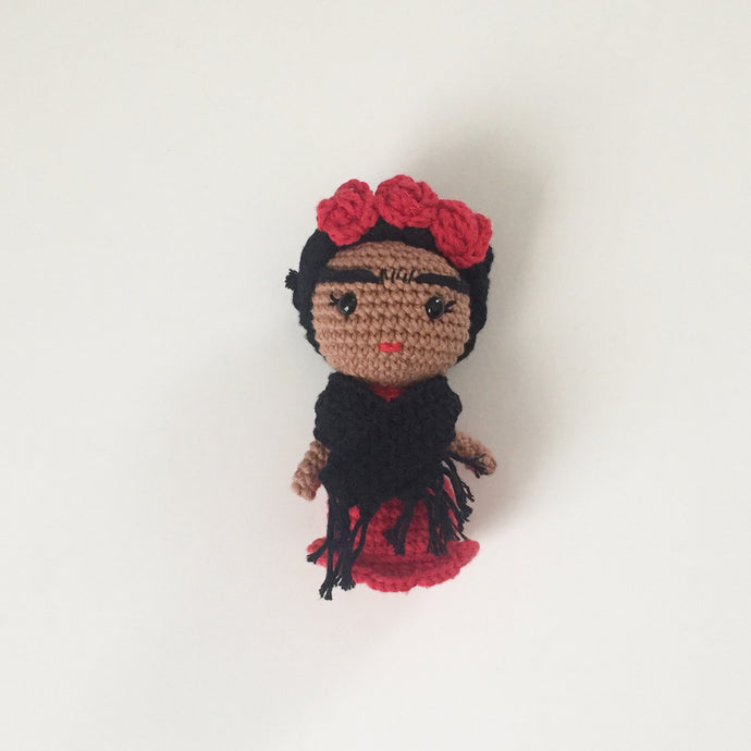 red mini doll