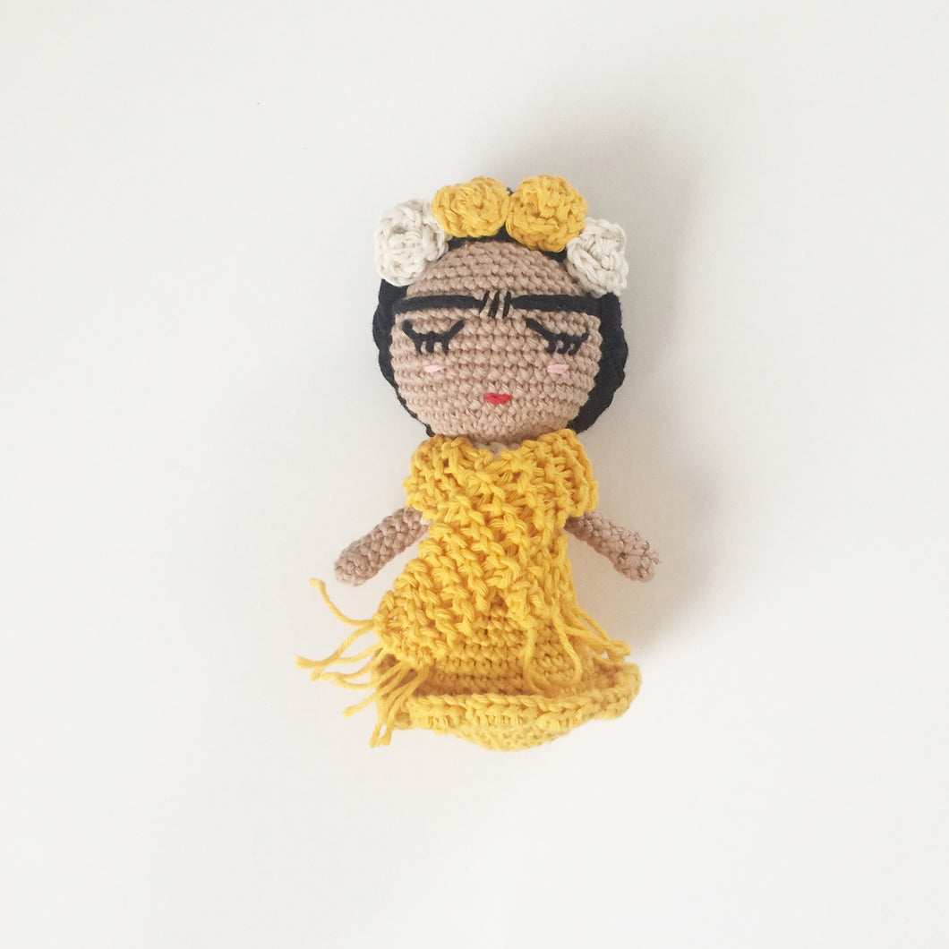 yellow small doll